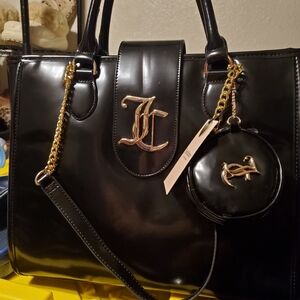 Elegant Black Handbag with Gold Accents